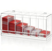 Clear 6-slot acrylic booster pack display dispenser with sealed trading card packs